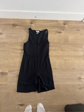 Aritzia Black Sleeveless V-Neck Bodysuit Romper contour